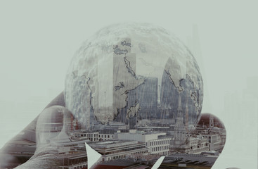 double exposure of businessman hand showing texture the world co