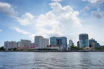 Fototapeta premium Buildings of Siriraj hospital along river