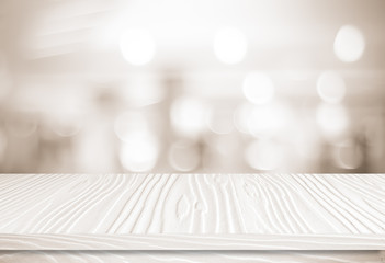 Empty white table and blurred store bokeh background, product display montage