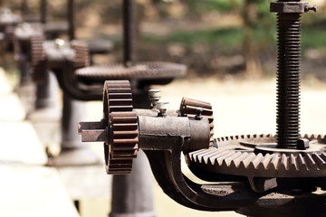 close-up mechanical gear with a large toothed wheel of Floodgate