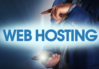 Businessman presses button web hosting on virtual screens. Busin