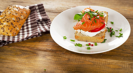 Sandwich with cereals bread and salmon