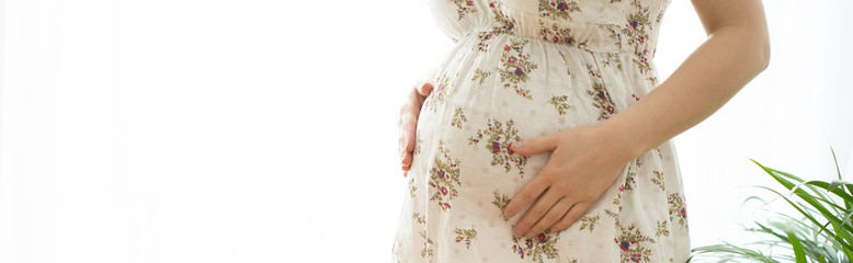 Obraz na płótnie Canvas Close-up to pregnancy belly