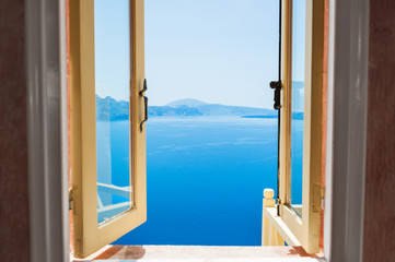 Naklejka na ściany i meble Open window with beautiful sea view.