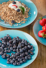 Fresh berries with  yogurt and muesli.