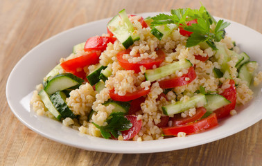 Salad with bulgur and fresh vegetables.