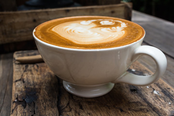 Coffee art on wooden table
