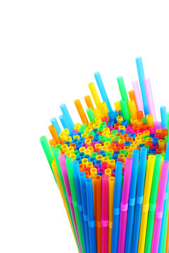 colorful plastic drinking straws on white background