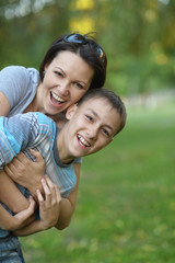 Obraz premium Mother with son in park