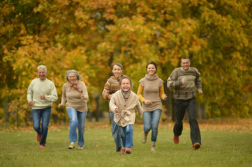 Fototapeta premium Activity happy family relaxing in forest