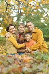 Fototapeta premium Family relaxing in autumn park