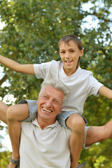 Obraz premium happy grandfather with his grandson 