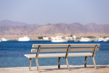 Bench on seashore