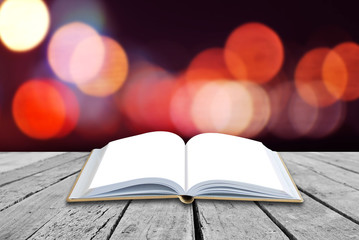 Open book with twilight background