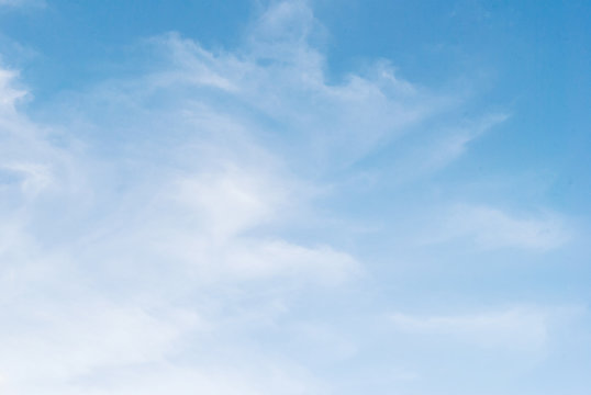 bright beautiful blue sky with clouds, as background