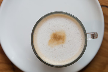 hot coffee on wood table