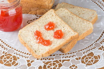 whole wheat bread with strawberry jam