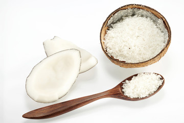Coconut with spoon isolated on white Background