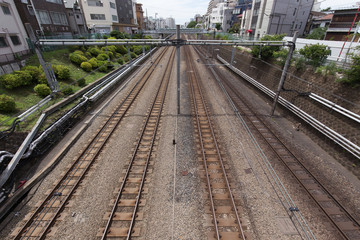 Fototapeta premium まっすぐの線路を捉えた鉄道・交通風景