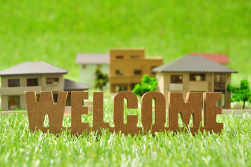ウェルカム 英語の文字と住宅