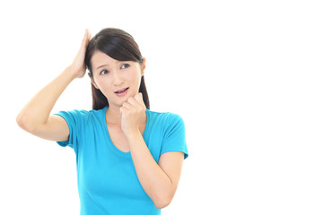 Fototapeta premium 困惑した表情の女性