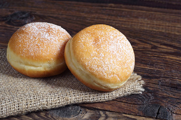 Two berliner donuts