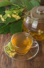 teapot and cup with linden tea