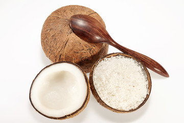 Coconut with spoon isolated on white Background