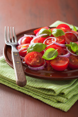 healthy tomato salad with onion basil olive oil and balsamic vin