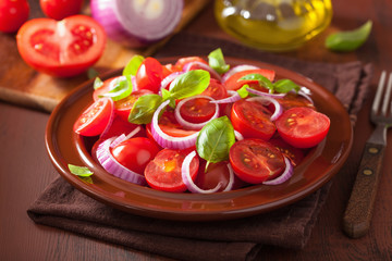 healthy tomato salad with onion basil olive oil and balsamic vin
