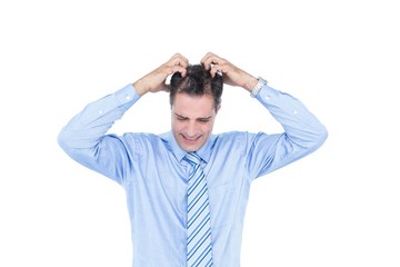  Anxious businessman with hands on his head