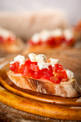 Tasty bruschetta with tomato