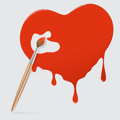 Brush with red paint.