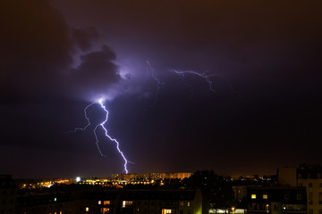 Lightning storm over city.