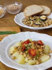 healthy dinner consist of legumes and vegetable, served with potatoes