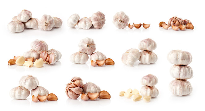 composite of fresh garlic  isolated on white background