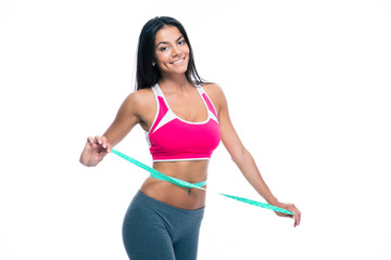 Happy woman with measuring tape