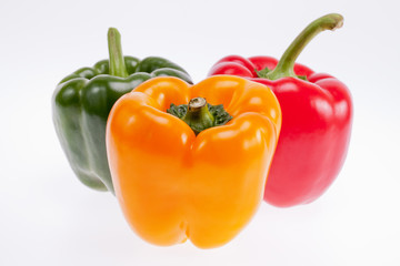 colorful peppers isolated on white background