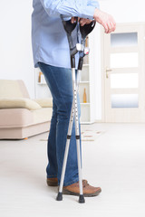 Man with crutches