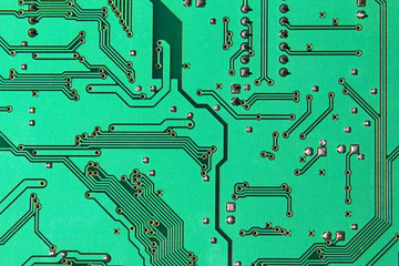 Green electronic microcircuit taken closeup.