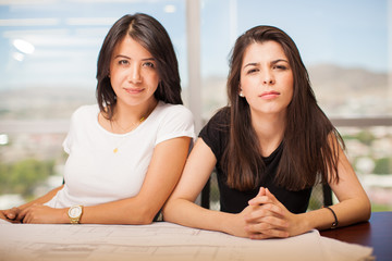 Pretty Hispanic women in an office