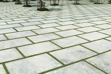 Grey brick stone street road. Light sidewalk, pavement texture