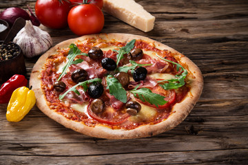 Delicious italian pizza served on wooden table