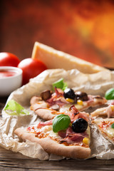 Delicious italian pizza served on wooden table