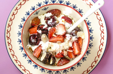 breakfast cottage cheese with yogurt fruits and nuts 