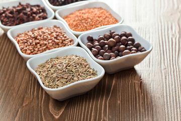 spices in small ceramic cups