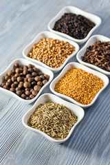 spices in small ceramic cups