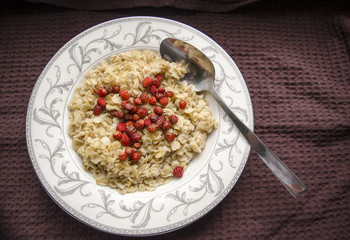 Oatmeal with fresh Berries for Healthy Breakfast.