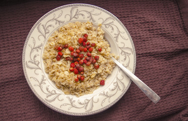 Oatmeal with fresh Berries for Healthy Breakfast.