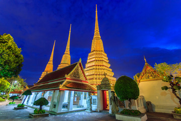 Fototapeta premium Wat Pho, Bangkok, Thailand. Also known as Wat Phra Chetuphon, 'Wat' means temple in Thai. The temple is one of Bangkok's most famous tourist sites. The temple has it's origins dating back to 1788.